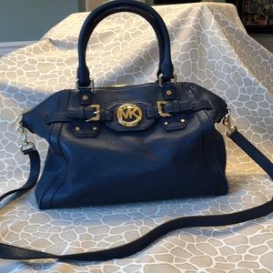 Michael Kors navy bag with long strap.